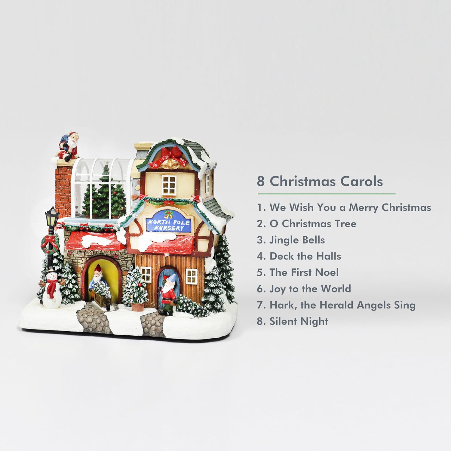 Musical North Pole Nursery Christmas Village 9.3” LED Polyresin Lighted Holiday House with Santa Gnomes Snow Scene