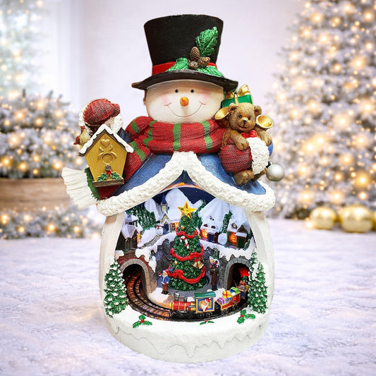 Snowman with Animated Christmas Village Scene LED Lighted Musical Holiday Decoration with Moving Train Adapter Included 18.7” Tall