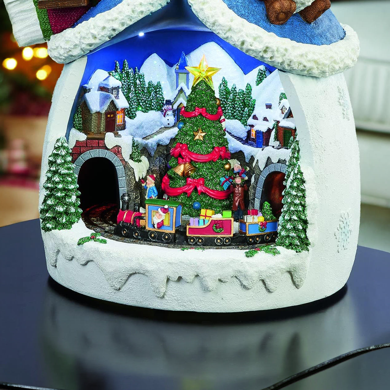 Snowman with Animated Christmas Village Scene LED Lighted Musical Holiday Decoration with Moving Train Adapter Included 18.7” Tall